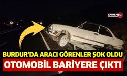 Burdur'da Otomobil Bariyerde Asılı Kaldı