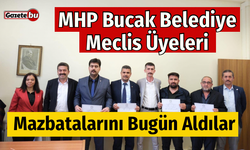 MHP Bucak Belediye Meclis Üyeleri Mazbatalarını Aldılar