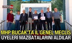 MHP Bucak’ta İl Genel Meclis üyeleri mazbatalarını aldılar
