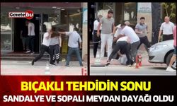 Bıçaklı tehdidin sonu, sandalye ve sopalı meydan dayağı oldu