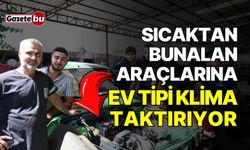 Sıcaktan bunalan eski araçlarına ev tipi klima taktırıyor