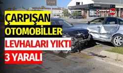 Çarpışan otomobiller levhaları yıktı: 3 yaralı