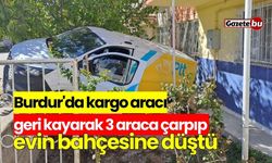 Burdur'da kargo aracı geri kayarak 3 araca çarpıp evin bahçesine düştü