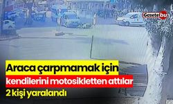 Araca çarpmamak için kendilerini motosiklette attılar