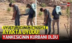 Uyuşturucunun etkisiyle ayakta uyudu, yankesicinin kurbanı oldu