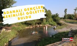 Adanalı gençler serinliği gölette buldu