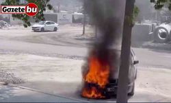 Yanan otomobilin imdadına beton mikseri yetişti