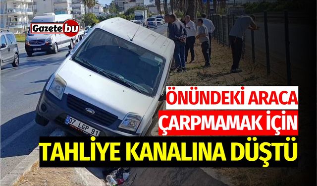 Önündeki araca çarpmamak için tahliye kanalına düştü