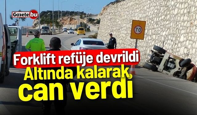 Forklift refüje devrildi: Altında kalarak can verdi