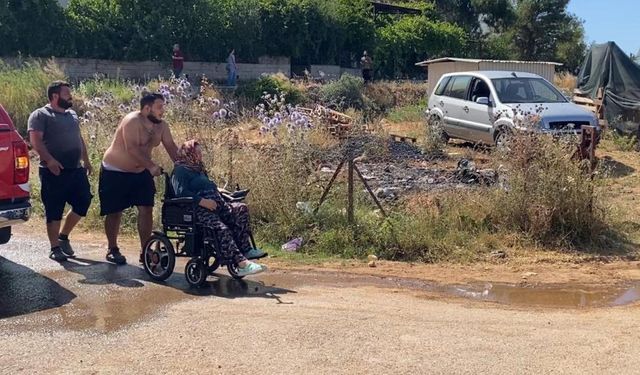 Evlere yaklaşan alevleri gönüce gözyaşlarını tutamadılar